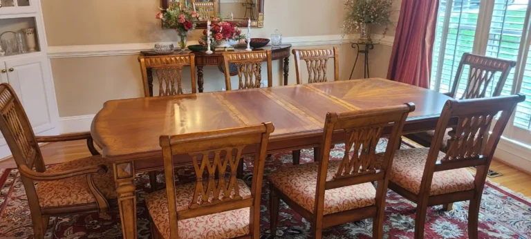How to Protect a Dining Table While Entertaining Guests 2 Elegant walnut and olive elm dining table refinished by Finish Pros, highlighting natural wood grain and professional craftsmanship.