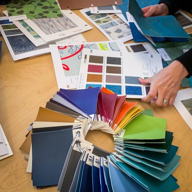 Curated upholstery fabric collection featuring green and blue cut velvet designs, chosen by the Finish Pros design team in Raleigh, NC.