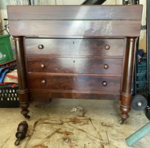 The base of a mid-19th century mahogany bureau desk.