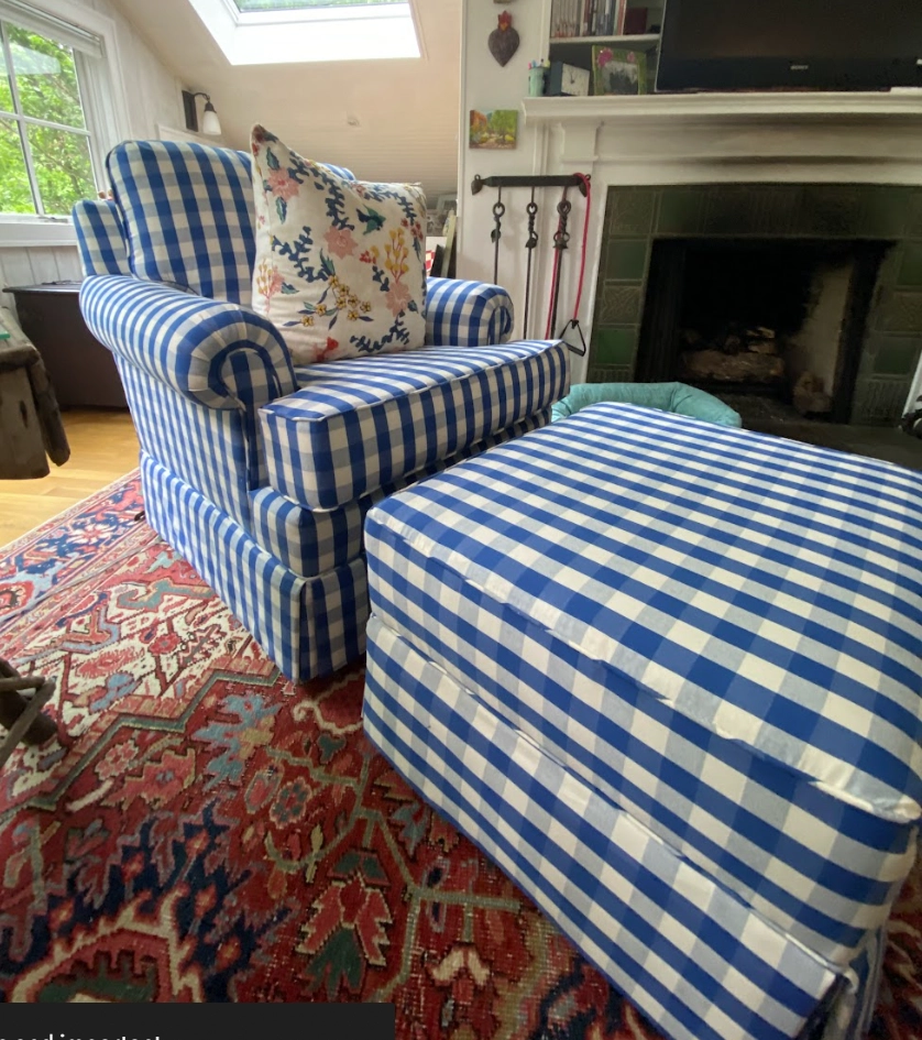 Protecting Upholstery Fabric: Tips from Raleigh’s Reupholstery Experts 3 Blue checkered armchair and ottoman reupholstered with custom upholstery fabric in a Raleigh NC home, showcasing expert pattern matching and tailored detailing by Finish Pros.