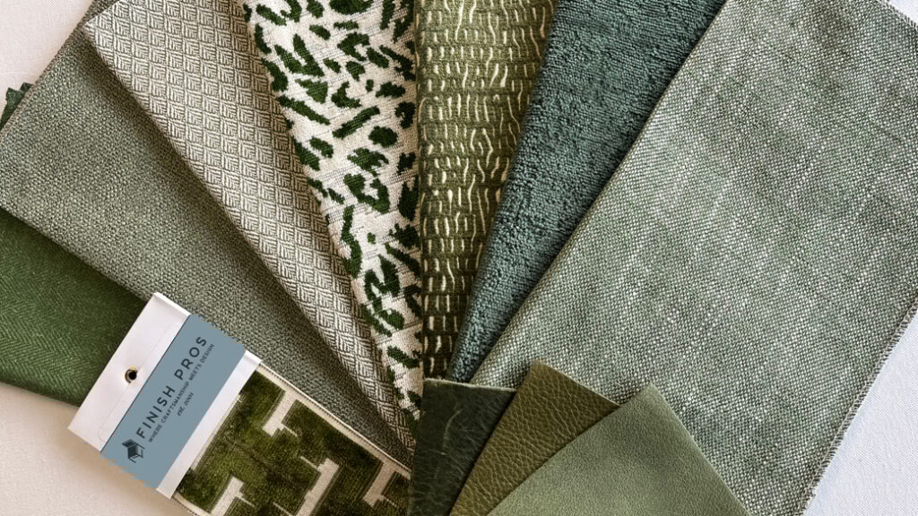 The Art of Reupholstery: How Finish Pros Transforms Raleigh Furniture with Craftsmanship and Care 2 A curated palette of green upholstery fabrics from Finish Pros, featuring MAGFabrics selections including Olympic in Moss, Hackett in Hunter, Current in Fern, Yoden in Green, and Mimus in Rosemary, arranged alongside textured wovens and leather samples for design inspiration.