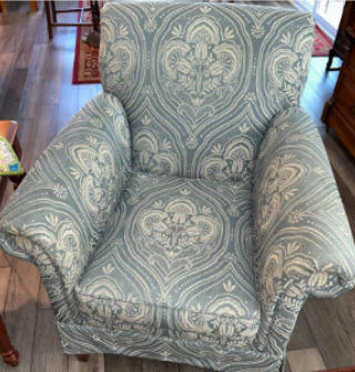 What to look for in quality furniture 4 Vintage armchair prior to reupholstery, shown in its original worn fabric.