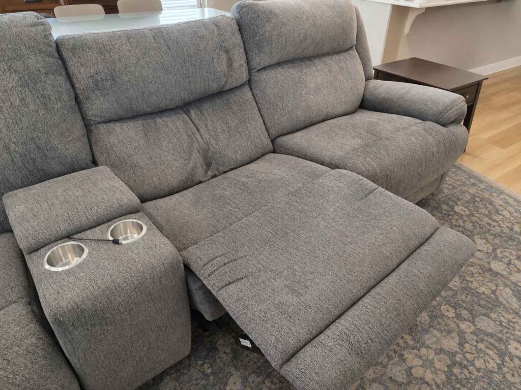 What Reupholstery Costs in Raleigh, and the 7 Things That Move the Price 5 Gray power reclining sofa, an example of motion furniture Finish Pros does not recommend reupholstering